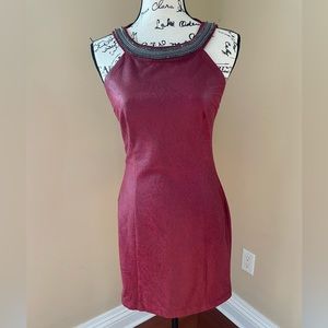Guess faux leather dress with rhinestones accent. Size 6. Excellent condition.